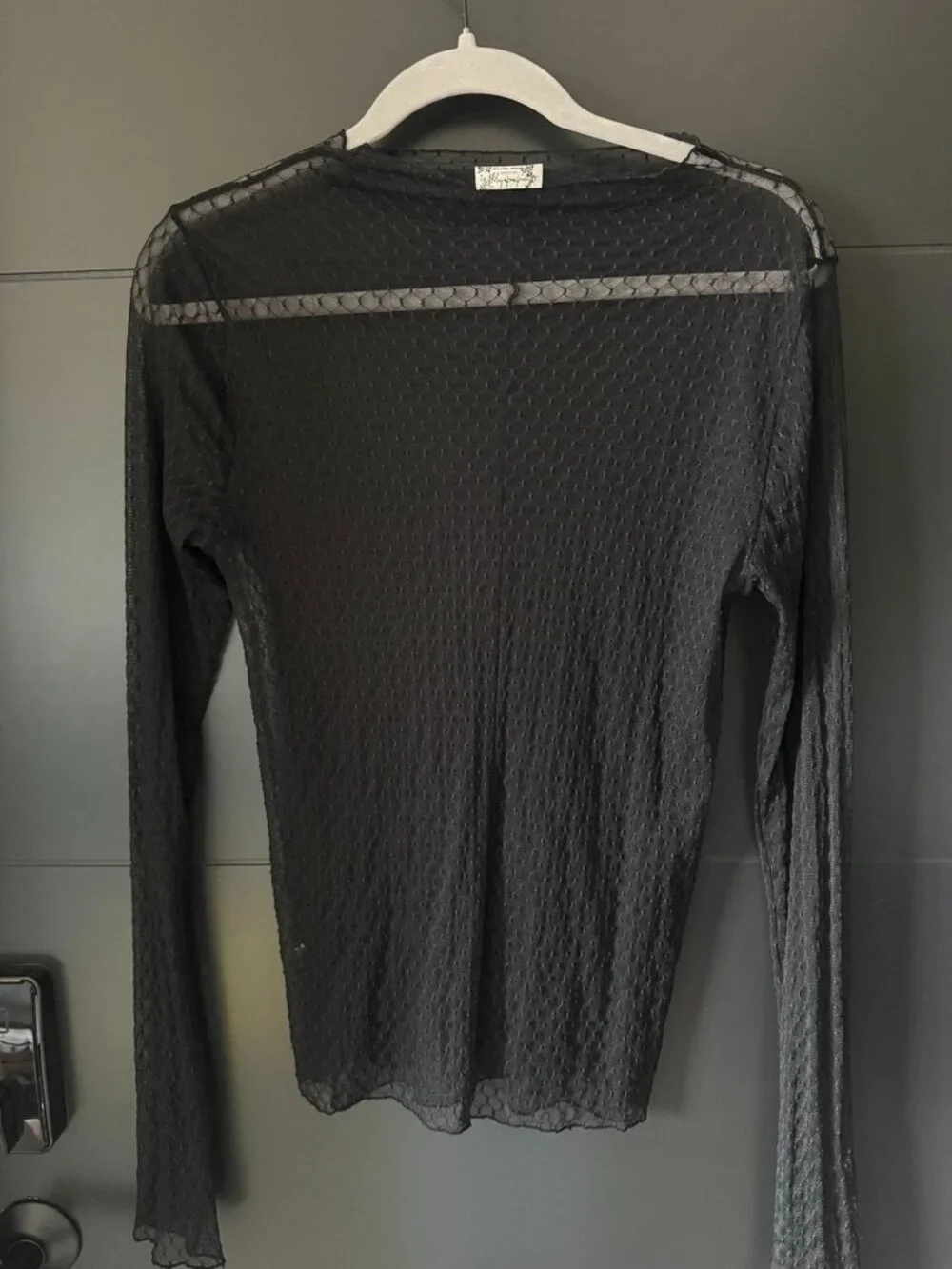 Free People black sheer mesh high-neck long sleeve